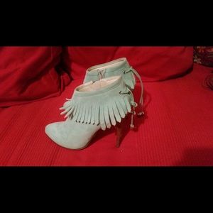 Light turquoise women’s heeled boots